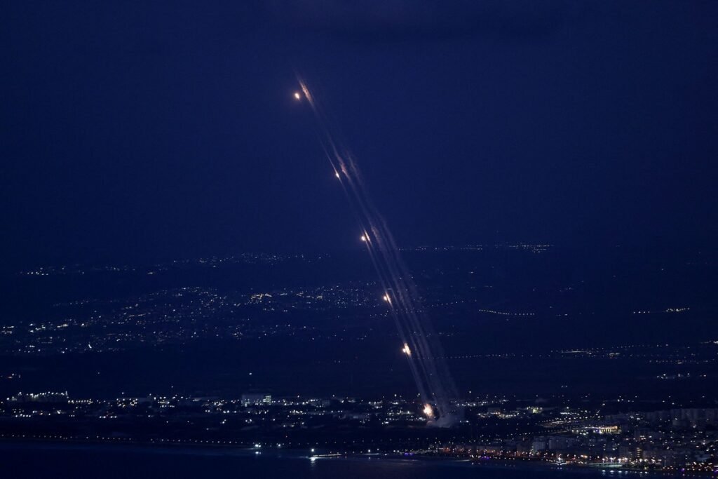 Israel's Iron Dome anti-missile system operates for interceptions as rockets are launched from Lebanon towards Israel, as seen from Haifa